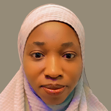 A portrait of a young lady wearing a hijab.