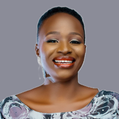 A portrait of a young lady smiling.