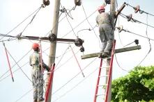 Power distributor engineers are working on the damaged pole in Lagos Nigeria, 23rd June 2019. Nigeria