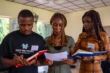 Three young Nigerians presenting during their Green academy.